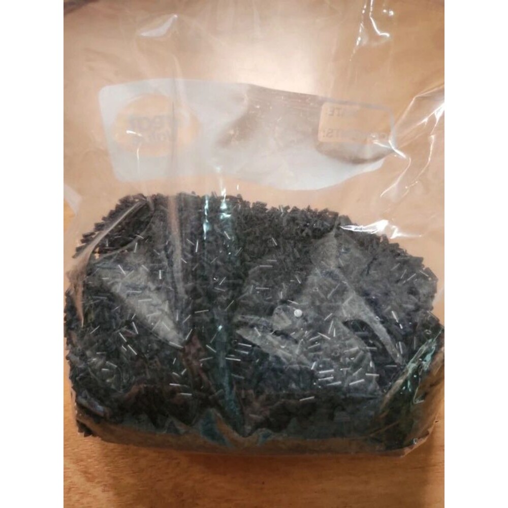 close to a pound of black bugle beads